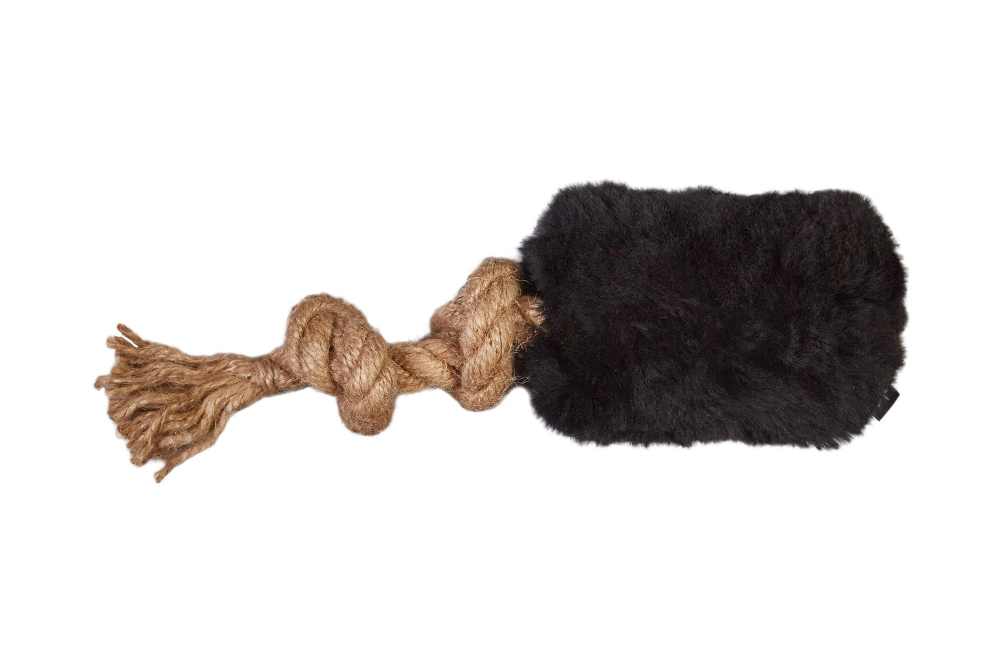 A Natural Sheepskin Dog Tug Toy with a rope attached to it, made from sustainable materials by Mellow Pet Store.