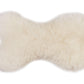 A soft Natural Sheepskin Dog Toy Bone from Mellow Pet Store on a bright white background.